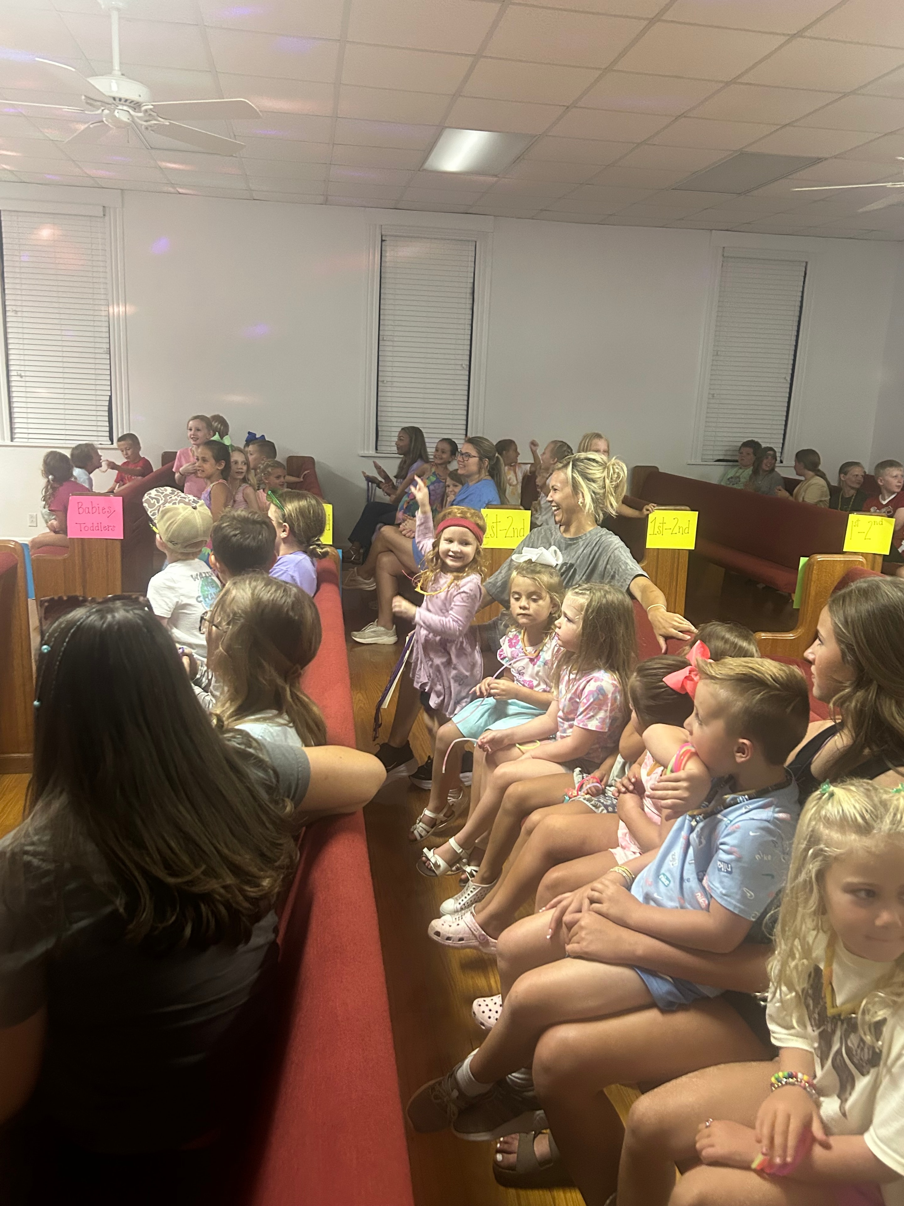 Large group of children lined up in the sanctuary at VBS 2026