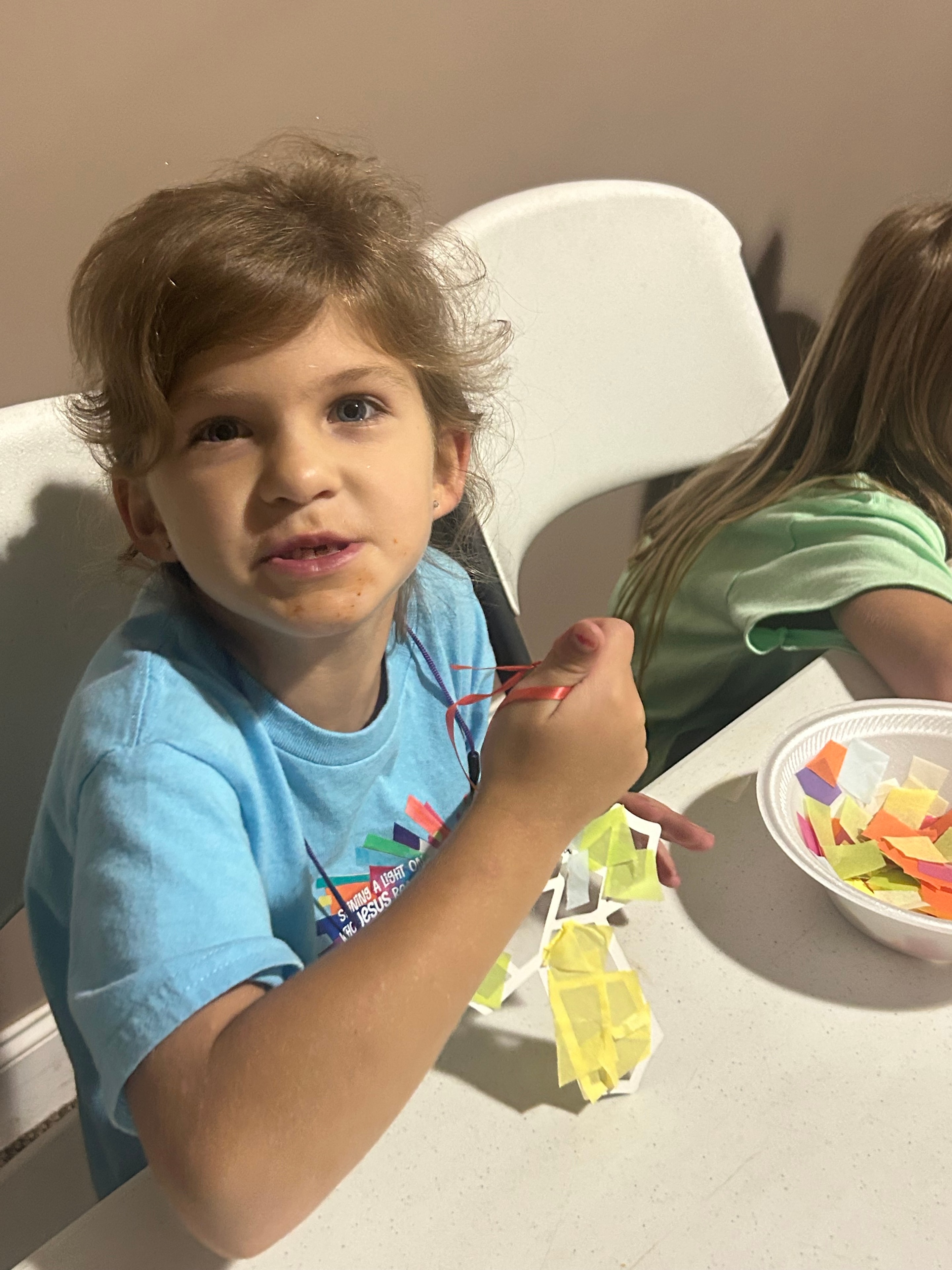 VBS 2026 joyful moment with children and staff