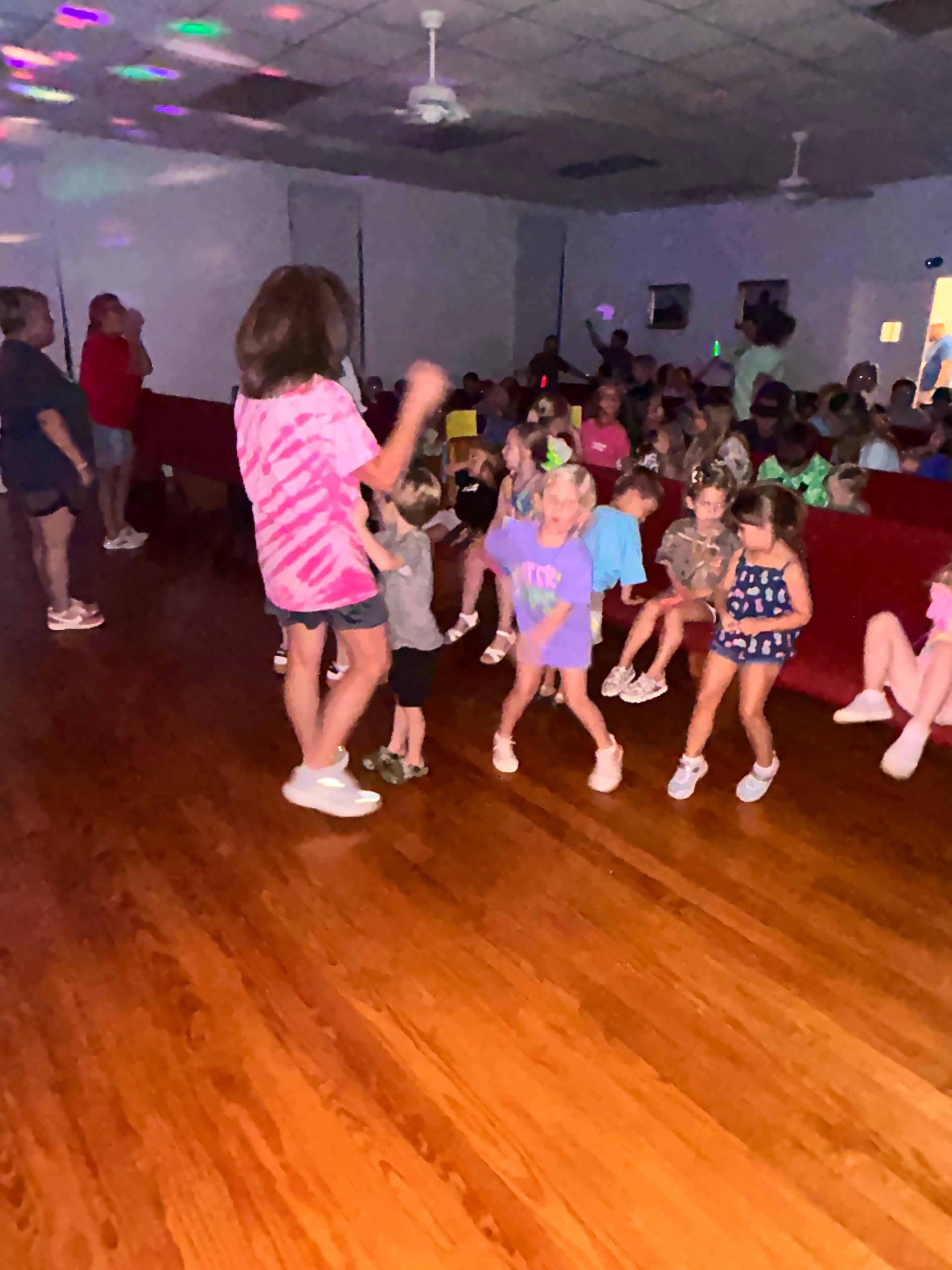 VBS 2026 children and volunteers in a fun group activity