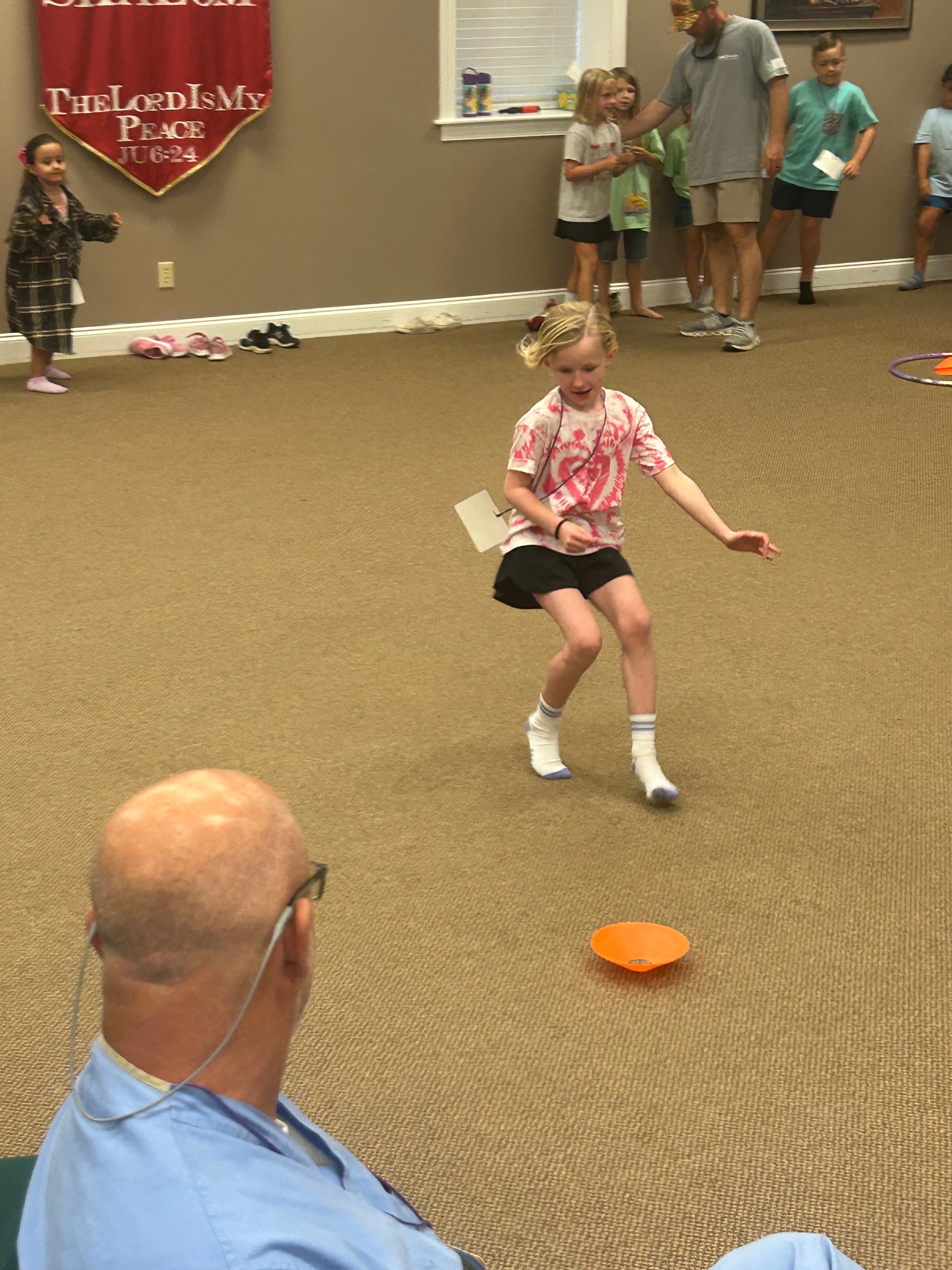 VBS 2026 children and staff sharing a joyful moment