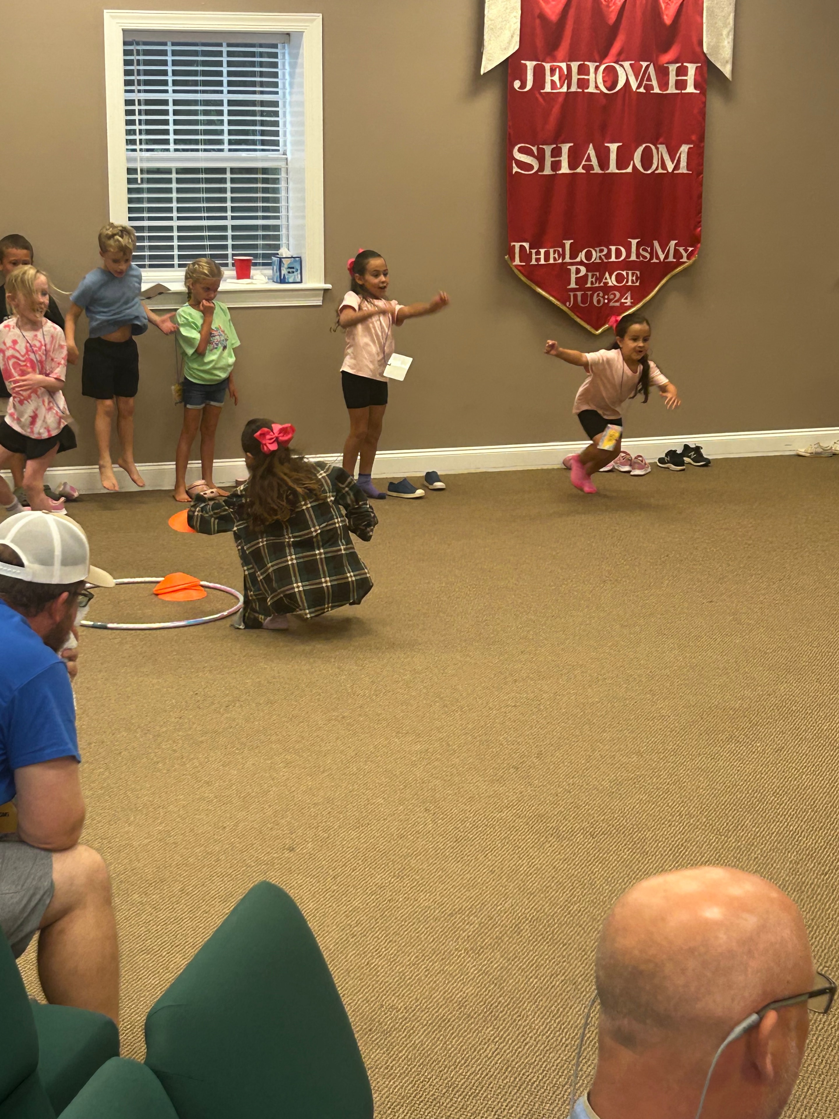 Children and volunteers enjoying games and activities at VBS 2026