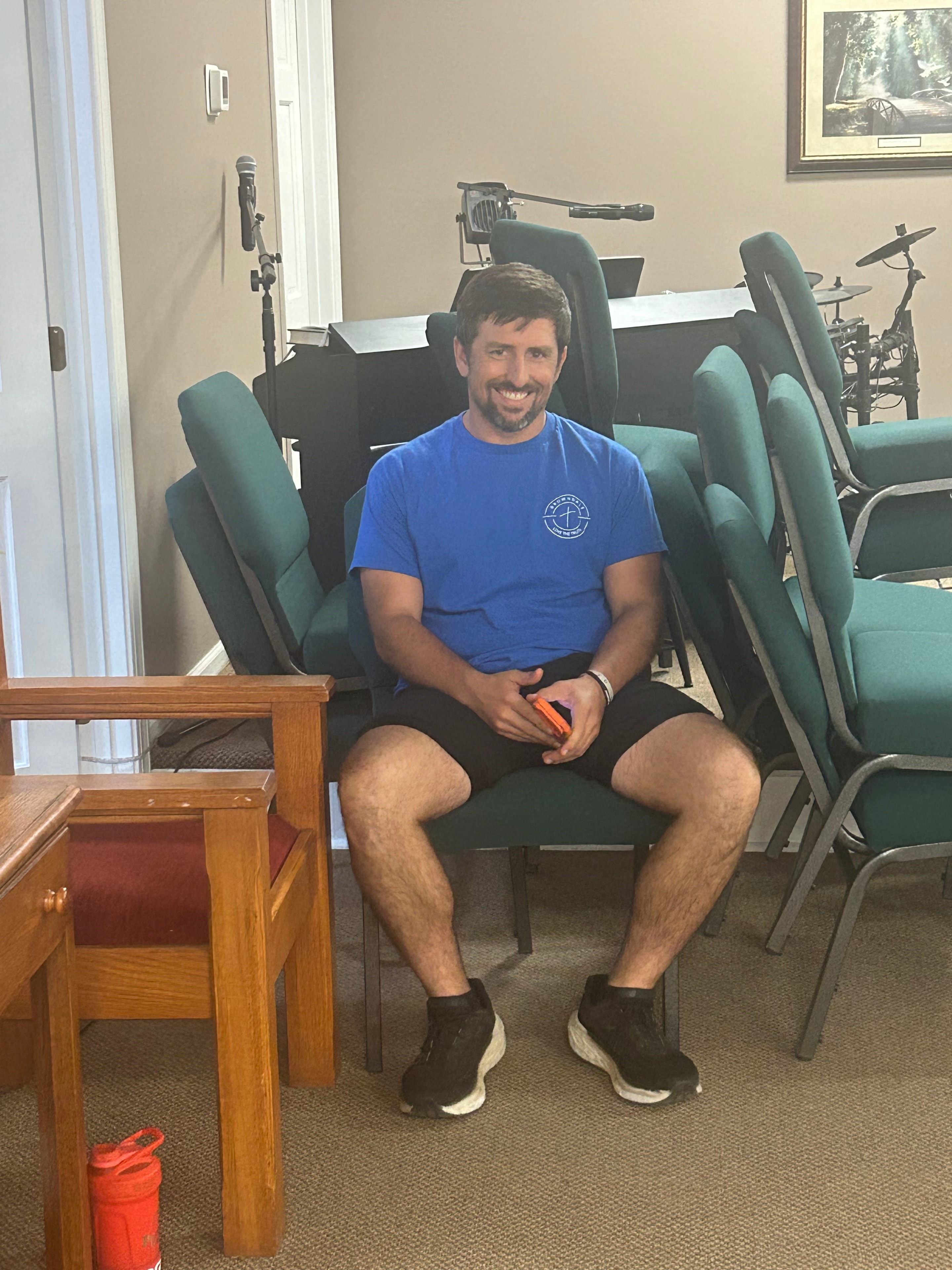 VBS staff member smiling in the fellowship hall